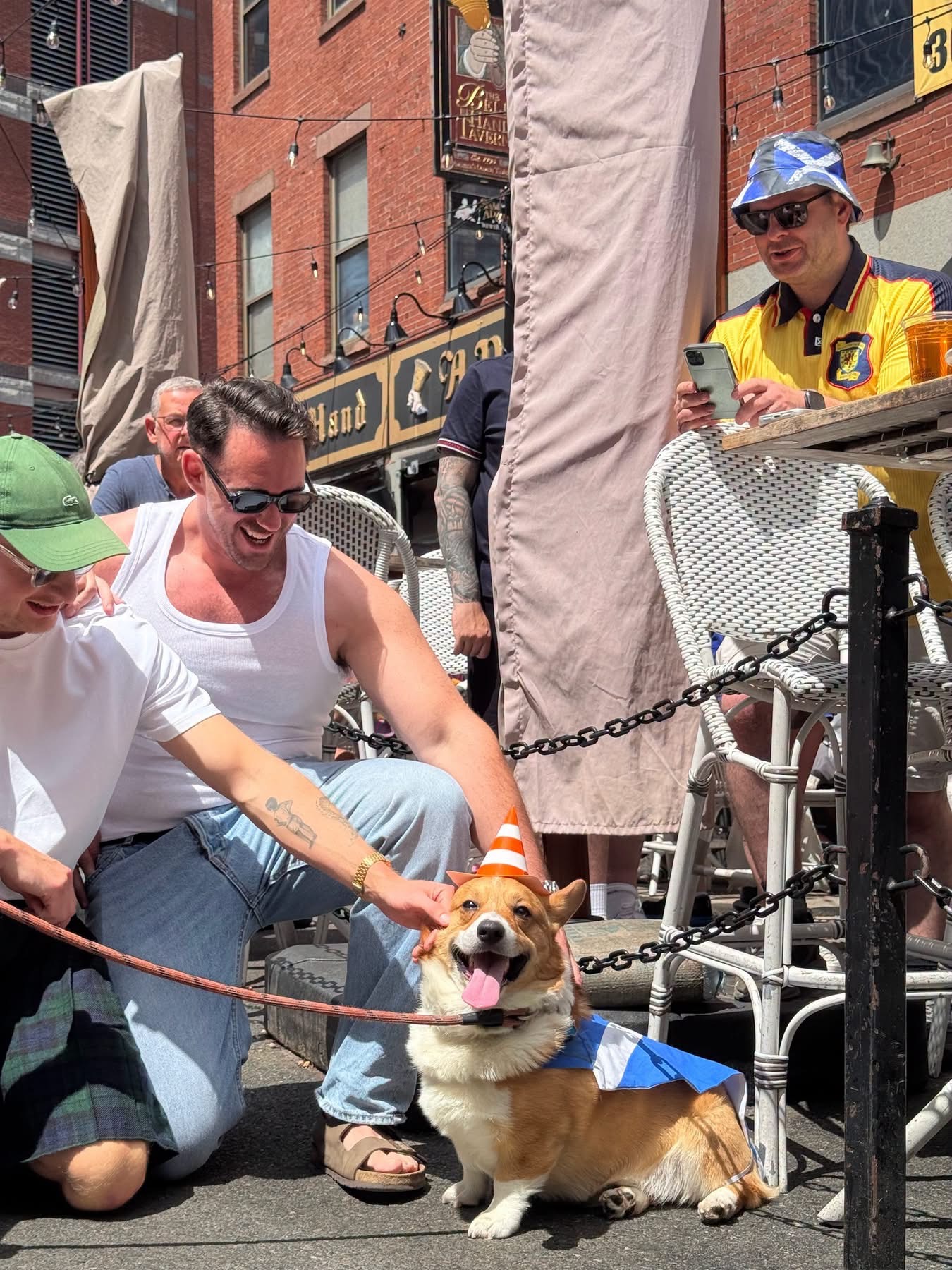 Rocko interacting with people outside a pub